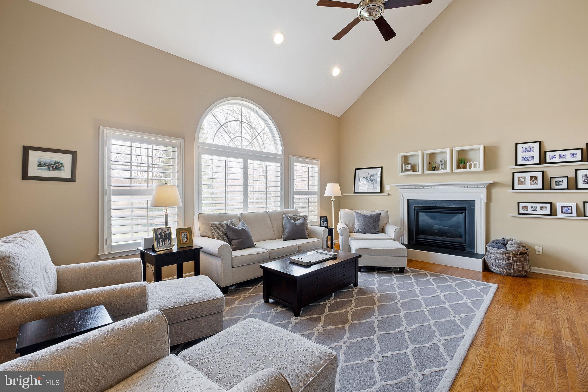 26 Woodside Farm Road Garnet Valley, PA 19060 - Photo 43 of 57 a living room with furniture windows and a fireplace