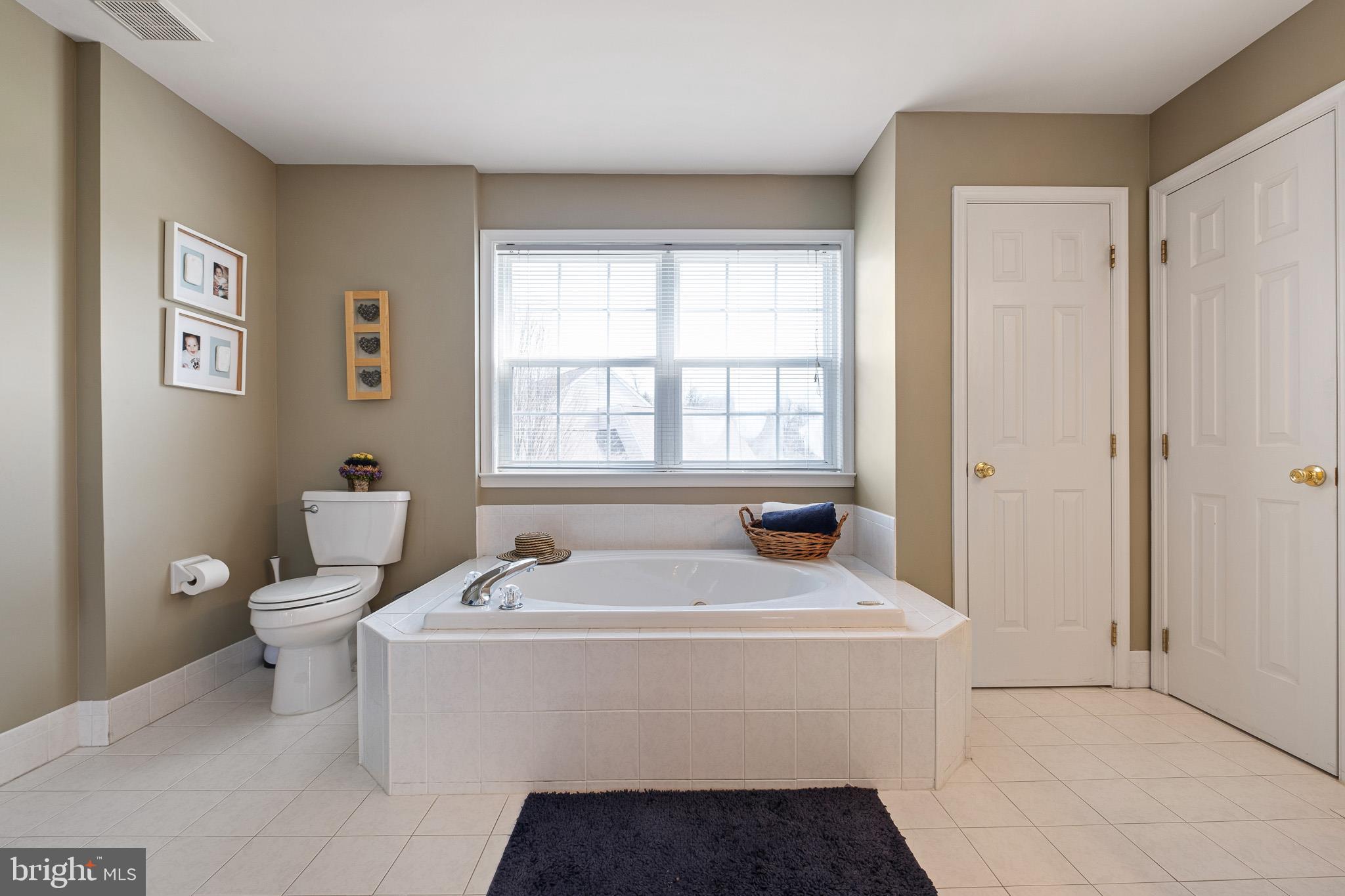 26 Woodside Farm Road Garnet Valley, PA 19060 - Photo 48 of 57 a room with a couch and a table in it