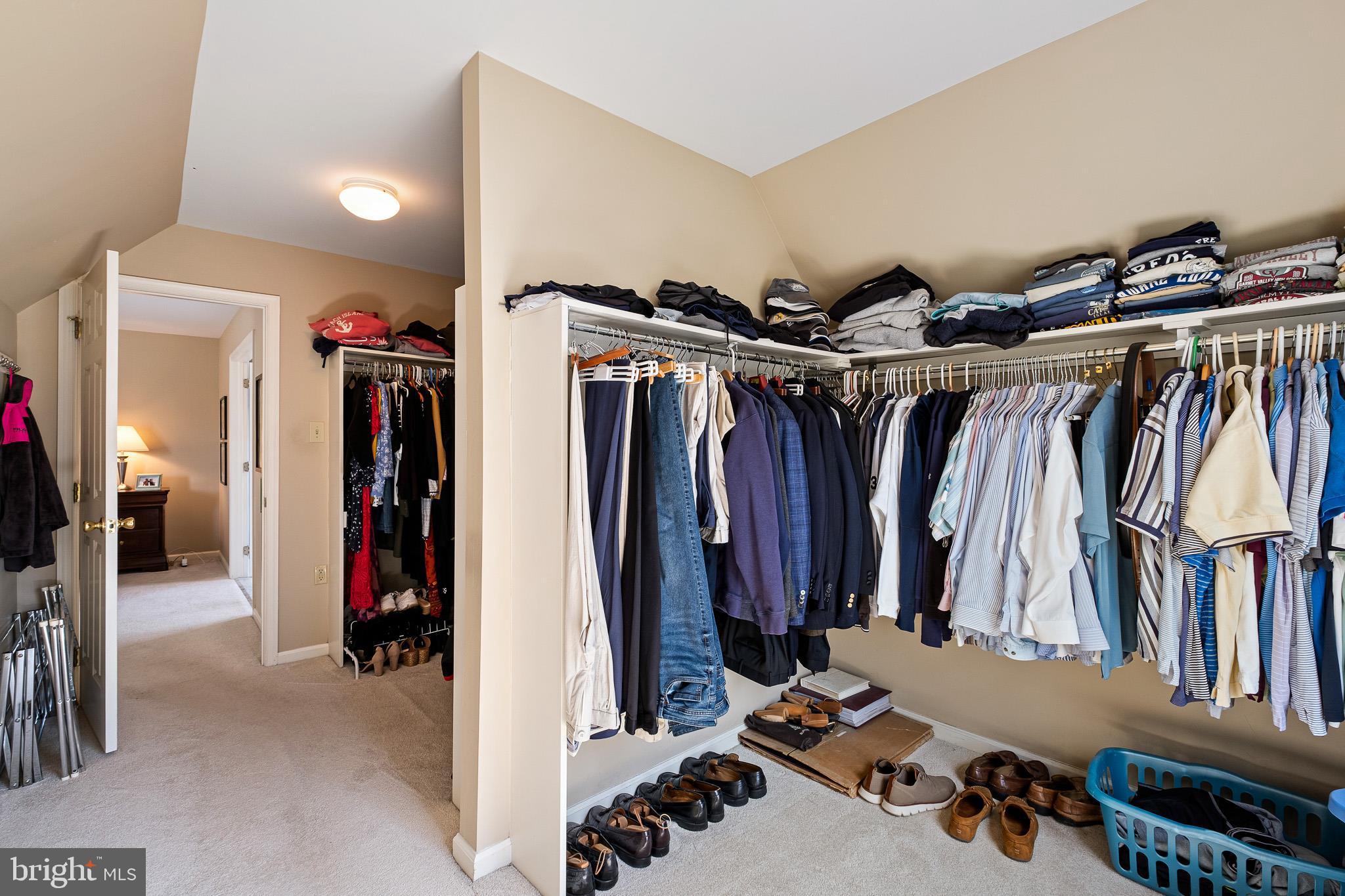 26 Woodside Farm Road Garnet Valley, PA 19060 - Photo 49 of 57 a view of walk in closet with clothes and shoes