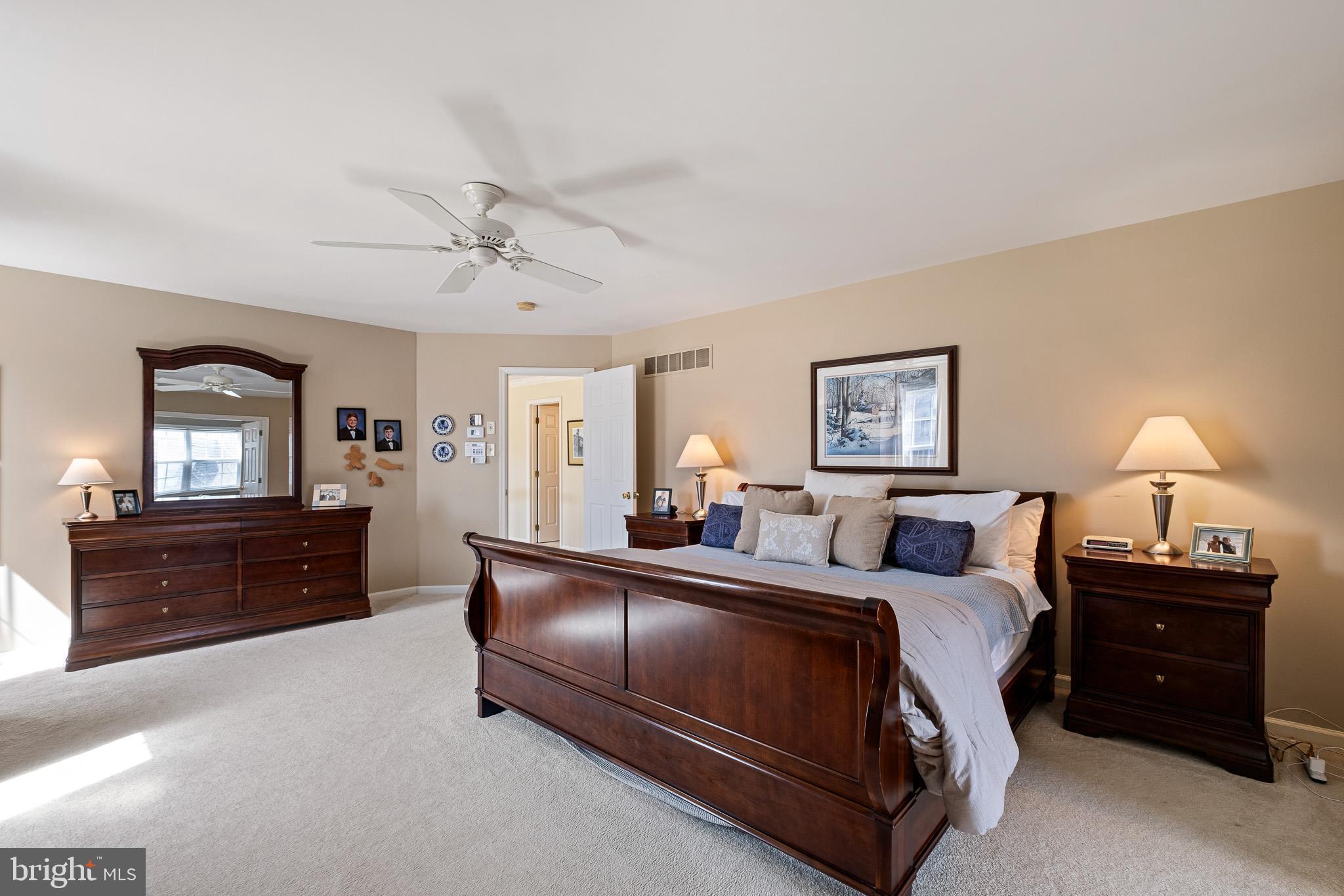26 Woodside Farm Road Garnet Valley, PA 19060 - Photo 50 of 57 a bedroom with a bed and a dresser