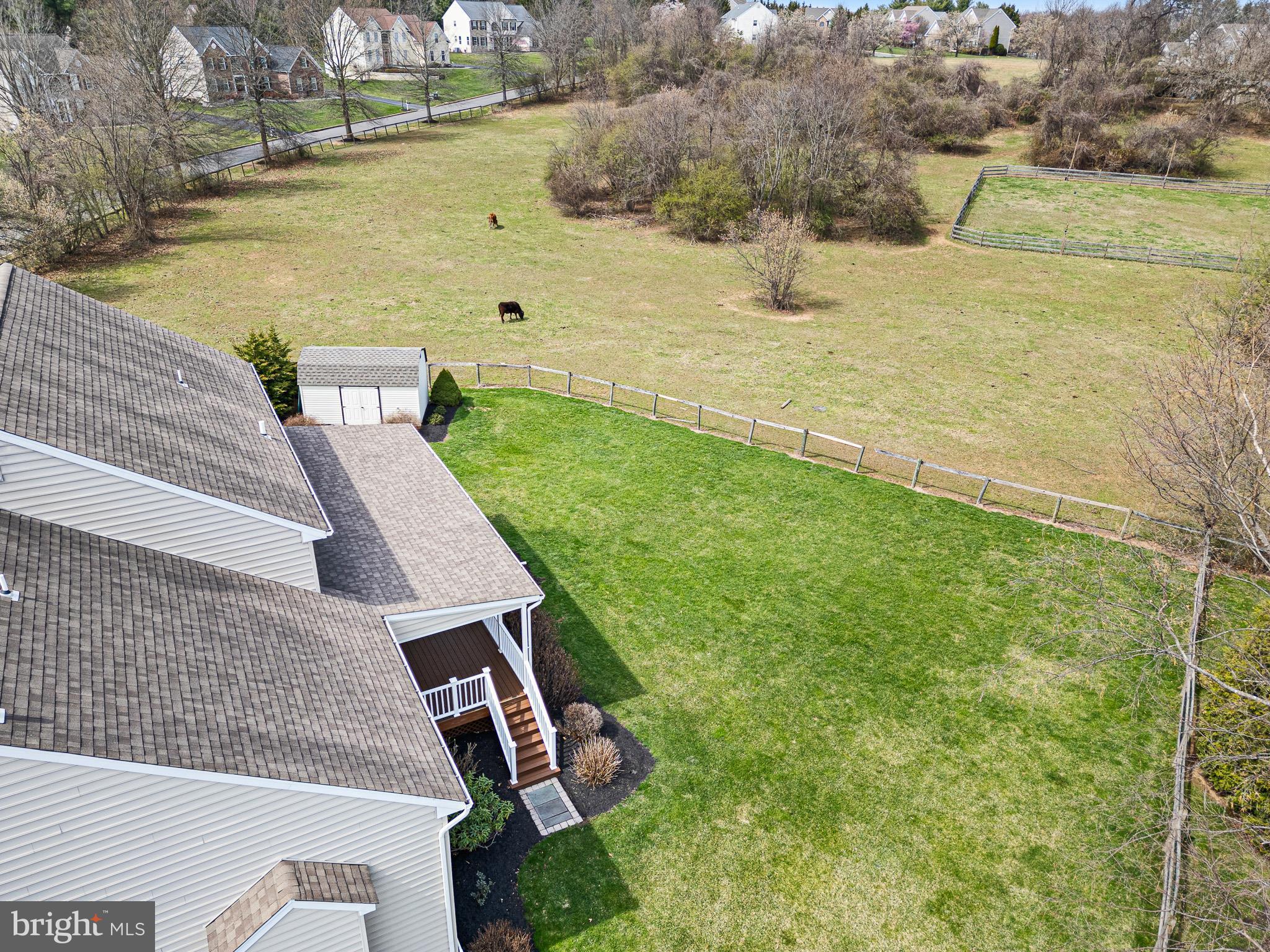26 Woodside Farm Road Garnet Valley, PA 19060 - Photo 8 of 57 a view of a yard with an outdoor space