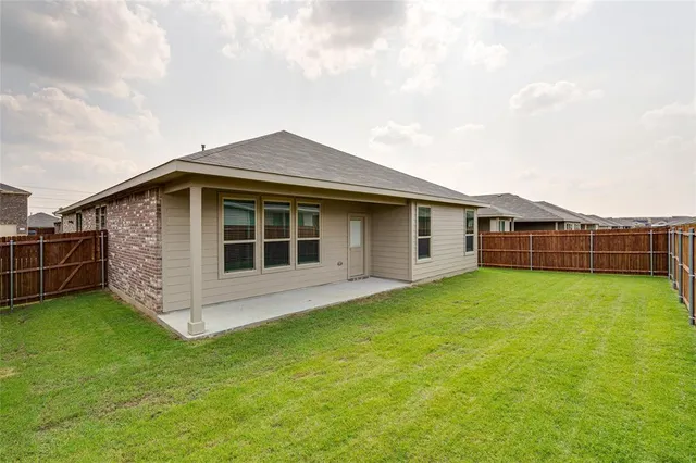 a view of a backyard with a garden