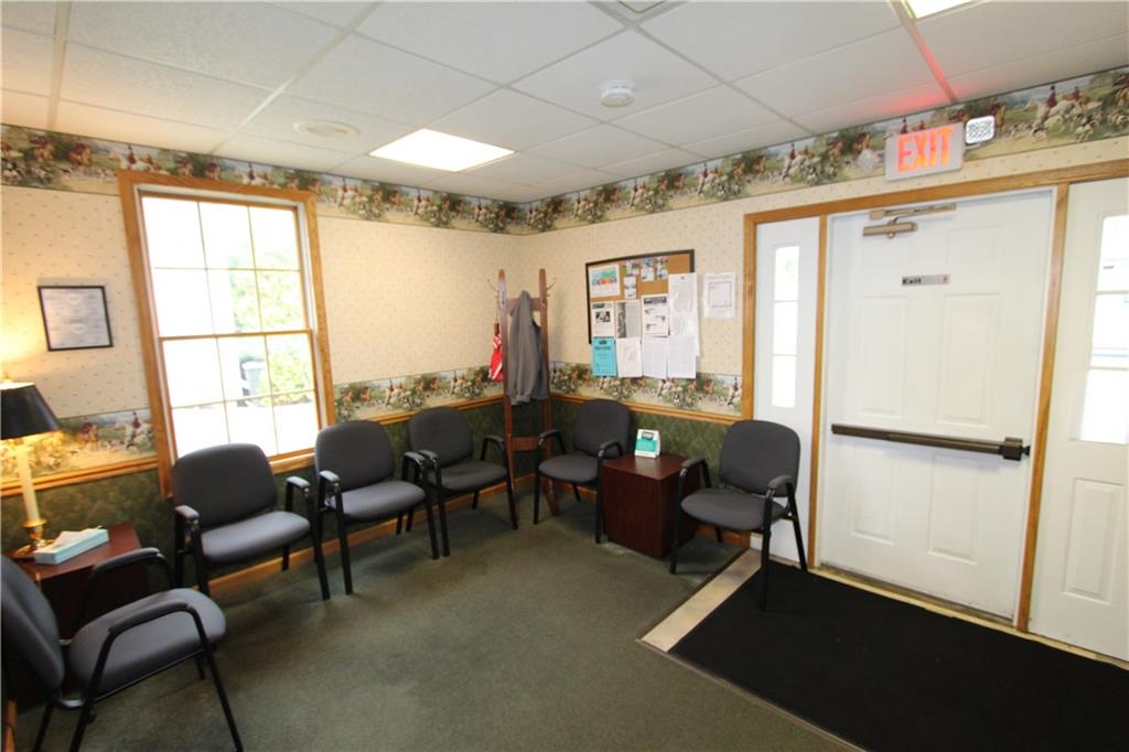 352 Railroad Street Ligonier, PA 15658 - Photo 12 of 28 a living room with furniture wooden floor and a window