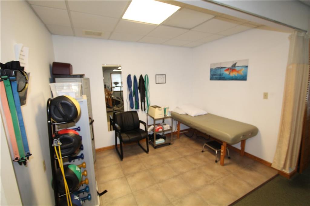352 Railroad Street Ligonier, PA 15658 - Photo 18 of 28 a living room with furniture and a gym machine
