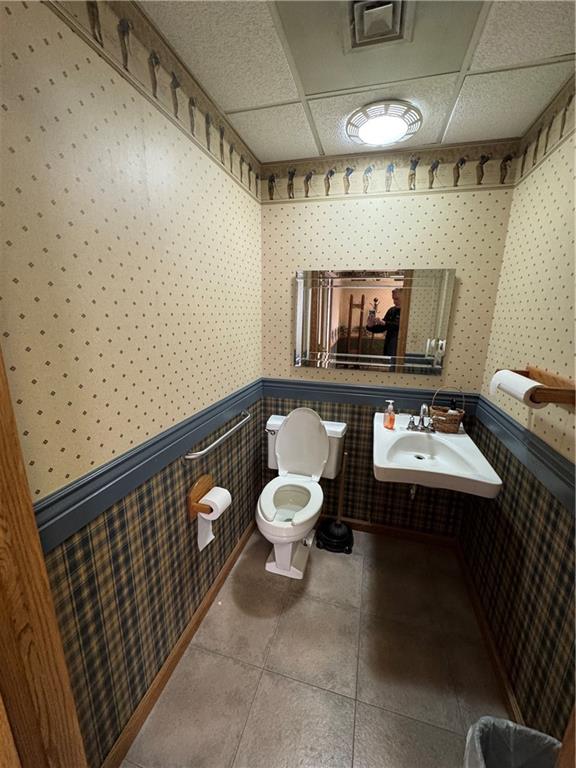 352 Railroad Street Ligonier, PA 15658 - Photo 28 of 28 a bathroom with a toilet sink and mirror