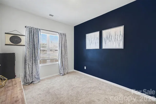 a view of a livingroom with a staircase