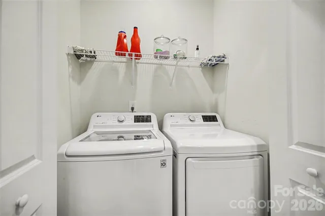 a utility room with dryer and washer
