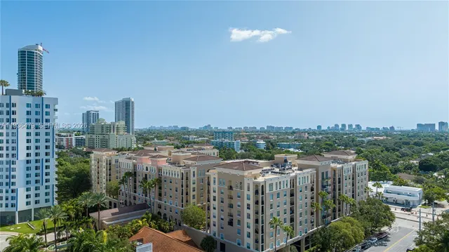 a view of a city with tall buildings