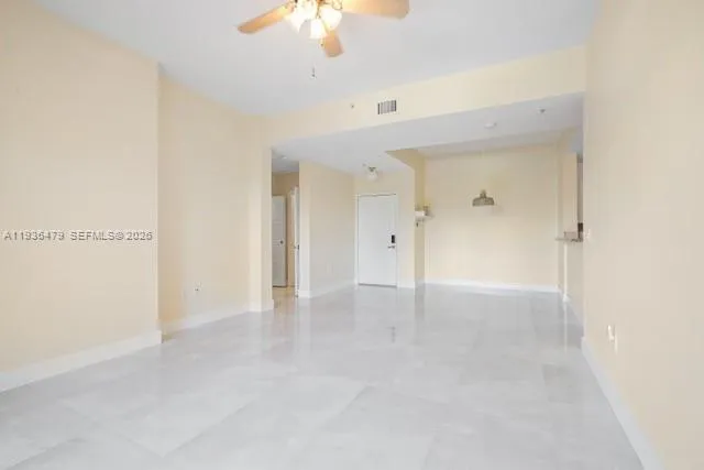 an empty room with a bathroom