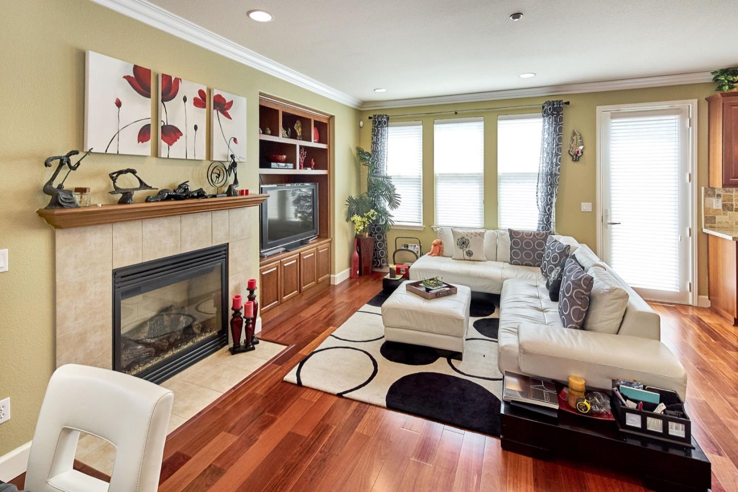 1570 Reston Terrace Sunnyvale, CA 94087 - Photo 11 of 39 a living room with furniture and a fireplace