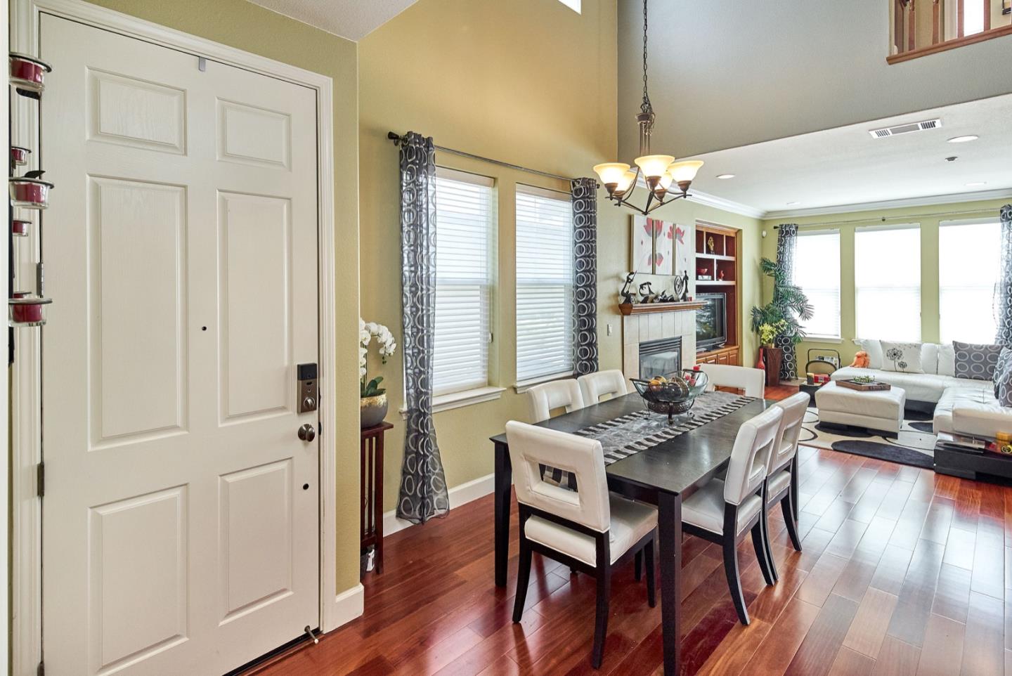 1570 Reston Terrace Sunnyvale, CA 94087 - Photo 3 of 39 a view of a livingroom with furniture window and wooden floor