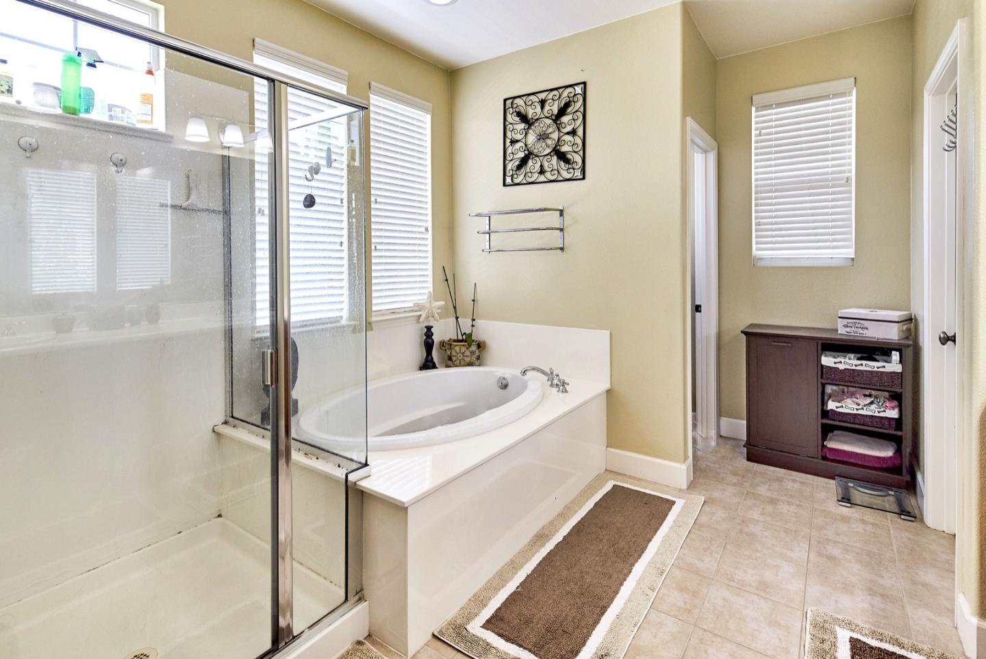 1570 Reston Terrace Sunnyvale, CA 94087 - Photo 23 of 39 a bathroom with a bathtub and a sink