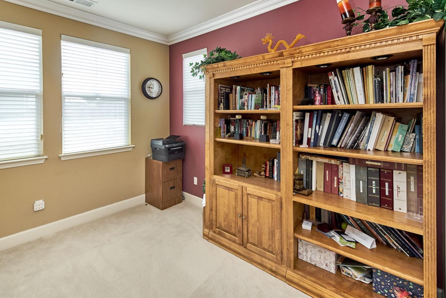 1570 Reston Terrace Sunnyvale, CA 94087 - Photo 29 of 39 a room with lots of books and a window