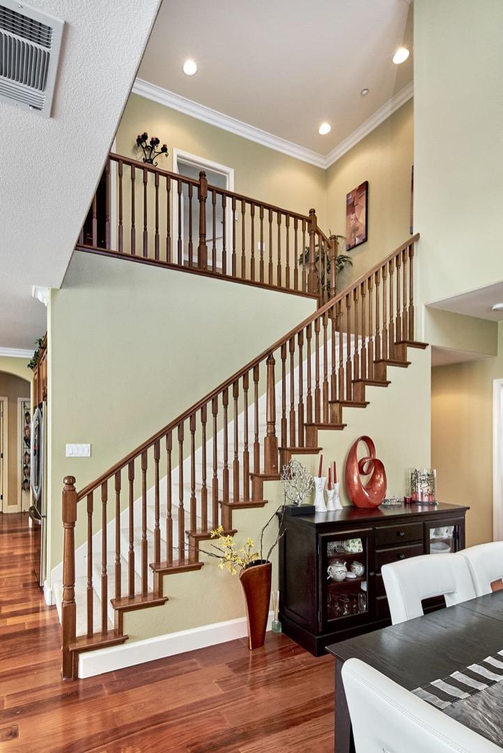 1570 Reston Terrace Sunnyvale, CA 94087 - Photo 5 of 39 a view of a hallway with wooden floor windows