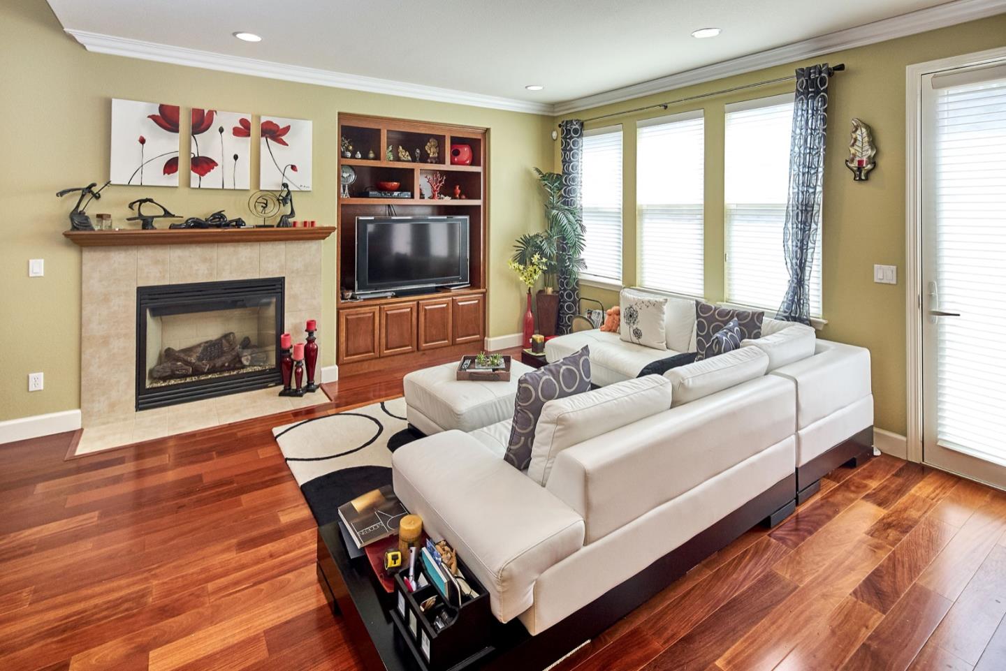 1570 Reston Terrace Sunnyvale, CA 94087 - Photo 7 of 39 a living room with furniture and a fireplace