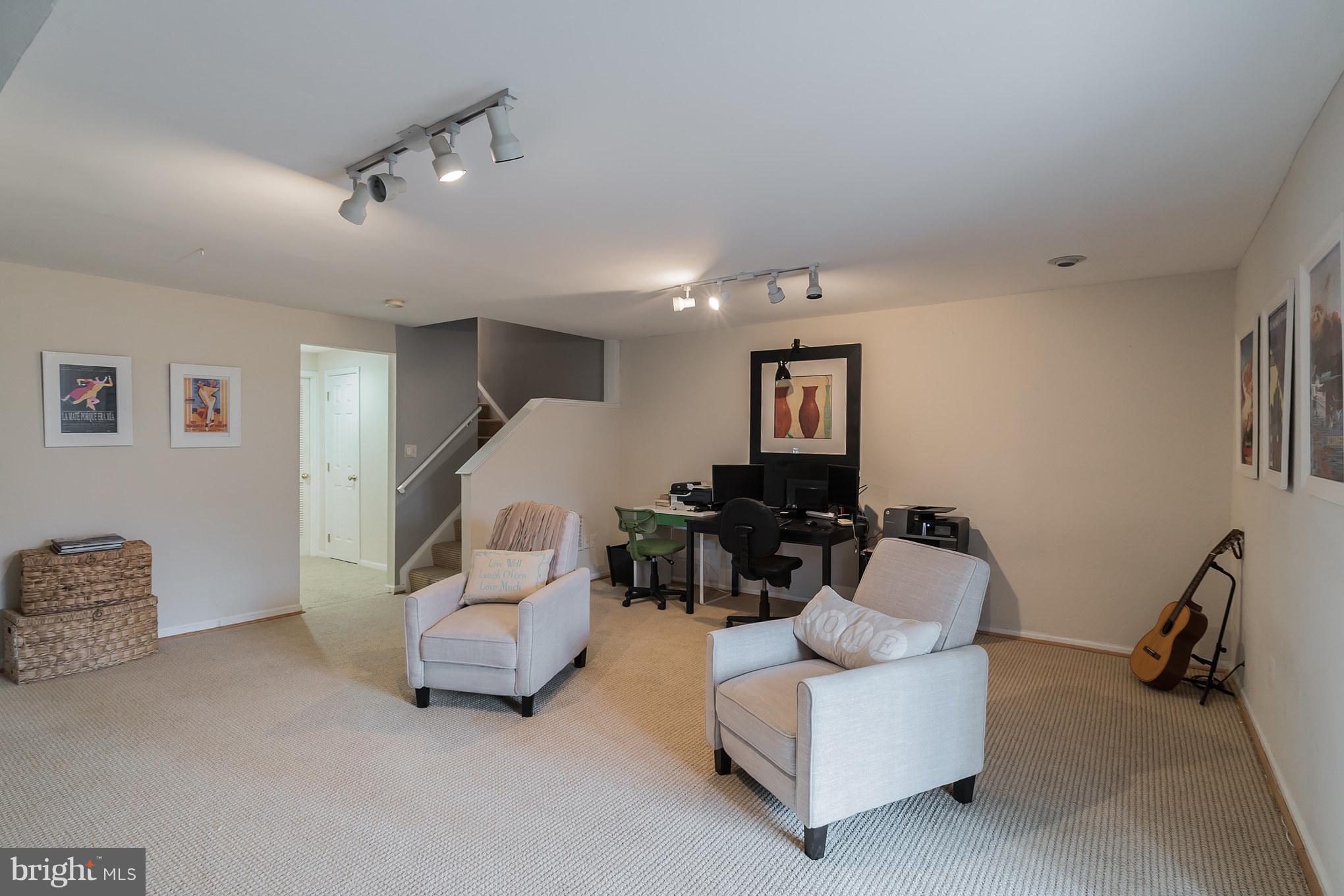 11459 Heritage Commons Way Reston, VA 20194 - Photo 24 of 30 a living room with furniture