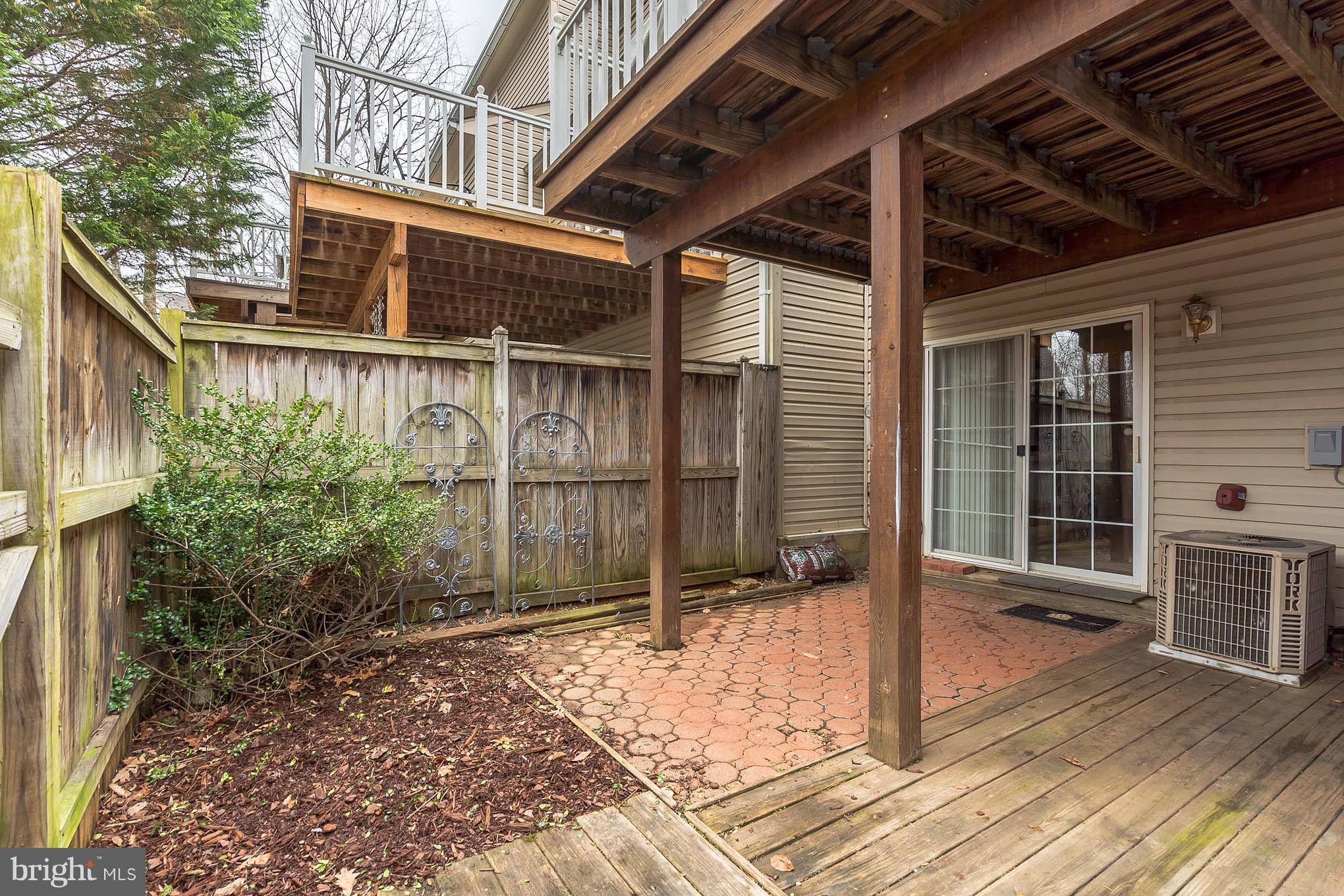 11459 Heritage Commons Way Reston, VA 20194 - Photo 29 of 30 a backyard of a house with seating space