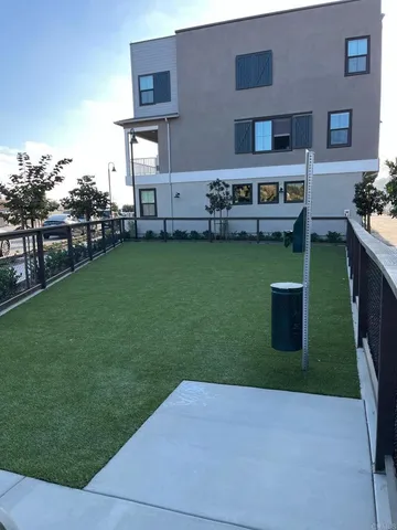a view of a house with a back yard