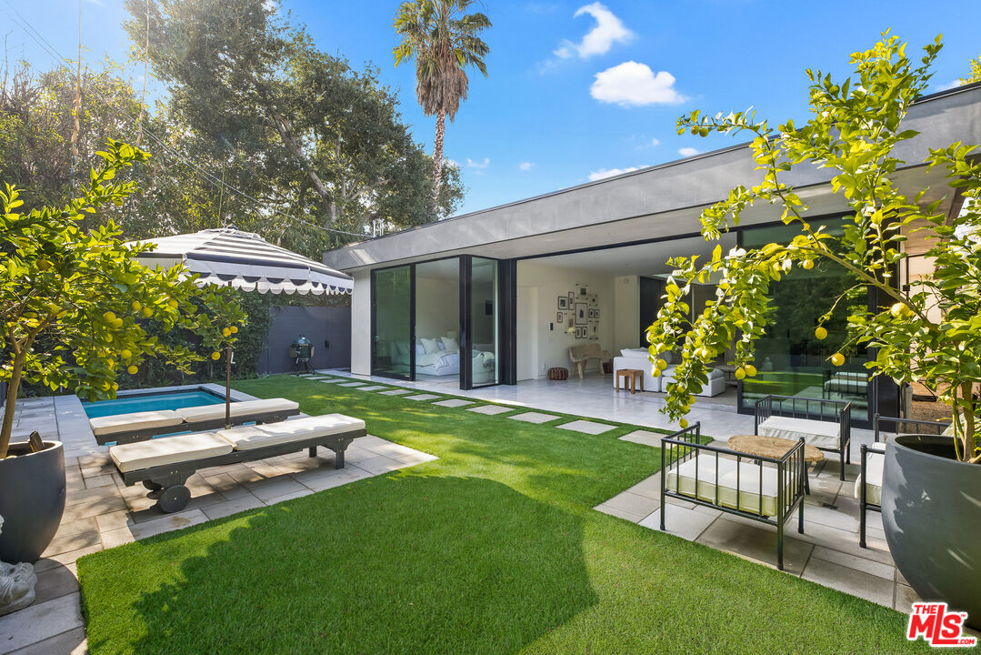 4122 Rhodes Avenue Studio City, CA 91604 - Photo 1 of 39 a garden view with a seating space