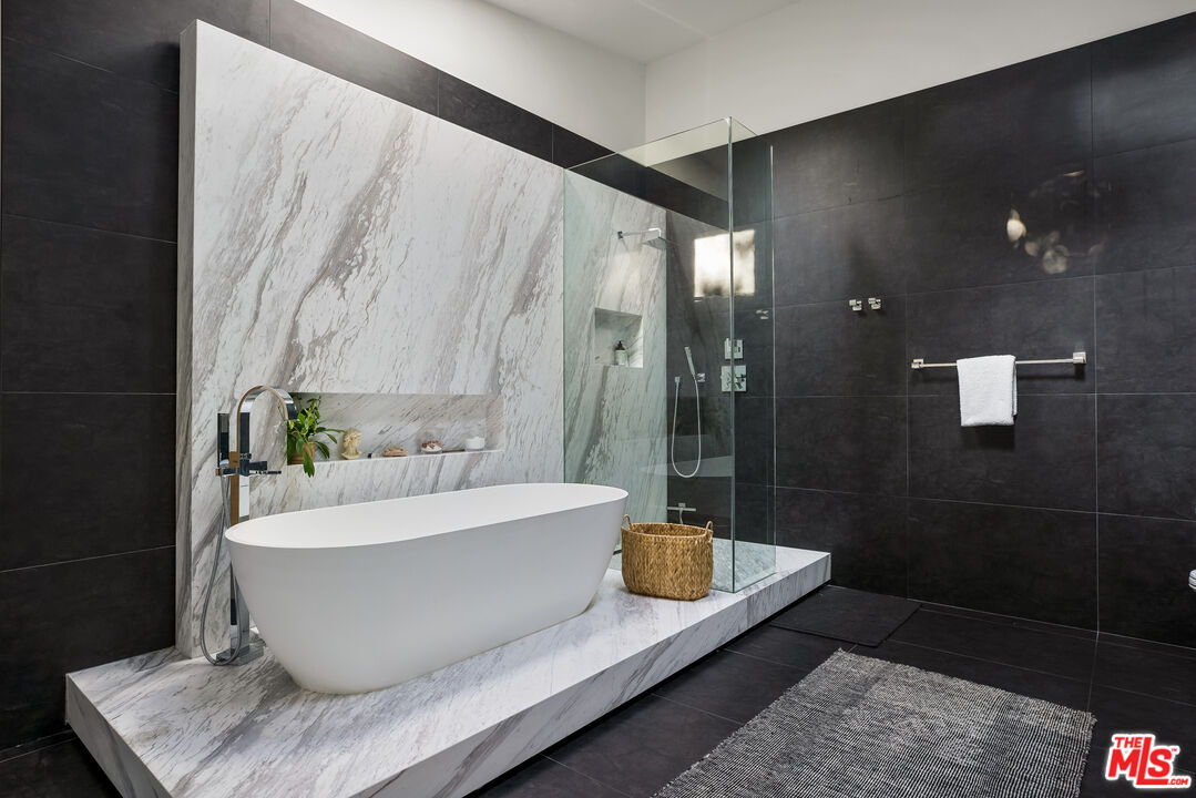 4122 Rhodes Avenue Studio City, CA 91604 - Photo 20 of 39 a bathroom with a bathtub and shower