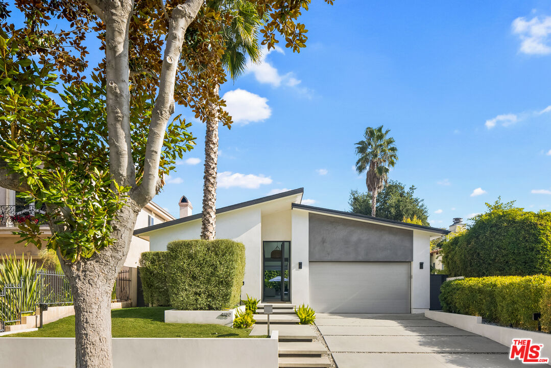 4122 Rhodes Avenue Studio City, CA 91604 - Photo 2 of 39 a front view of a house with garden