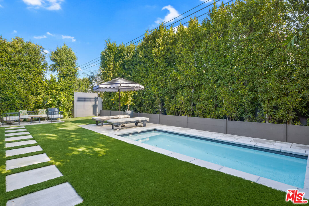 4122 Rhodes Avenue Studio City, CA 91604 - Photo 34 of 39 a view of a house with a yard porch and sitting area