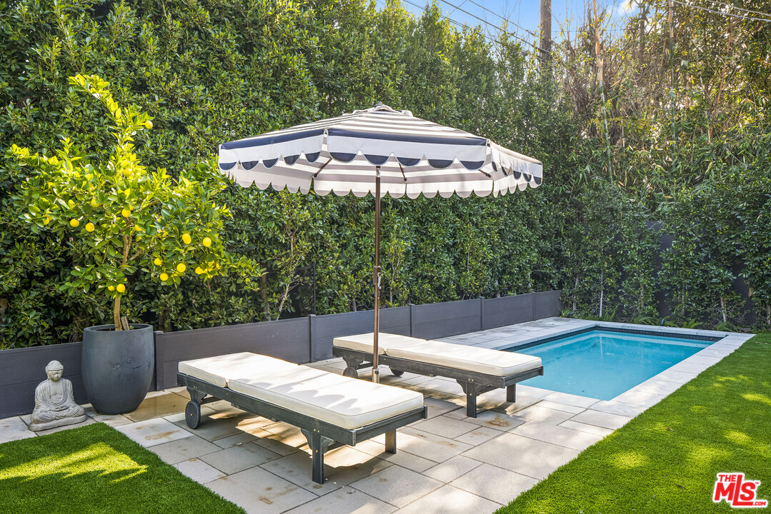 4122 Rhodes Avenue Studio City, CA 91604 - Photo 38 of 39 a view of a backyard with sitting area