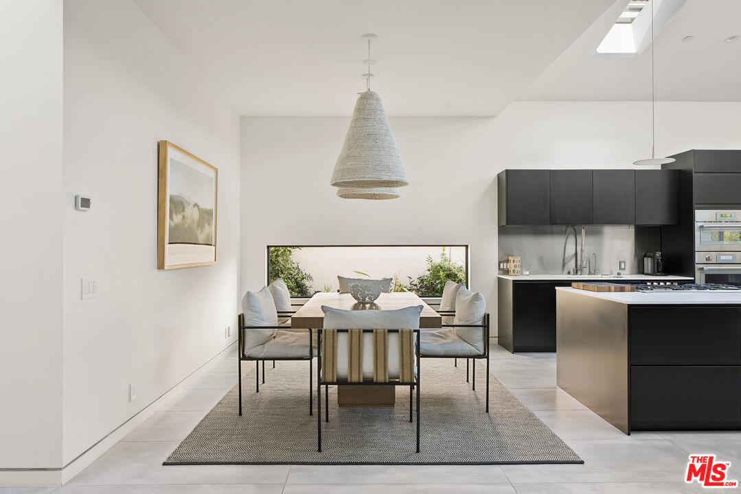 4122 Rhodes Avenue Studio City, CA 91604 - Photo 9 of 39 a dining room with furniture and window