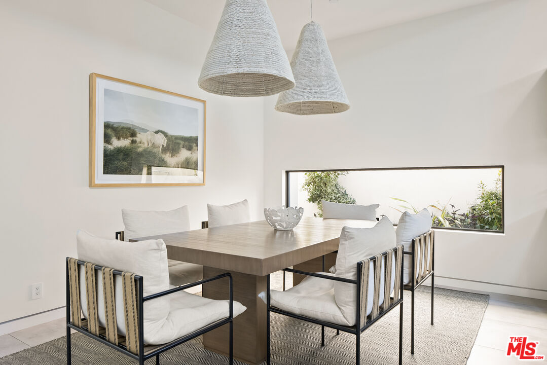 4122 Rhodes Avenue Studio City, CA 91604 - Photo 10 of 39 a view of a dining room with furniture