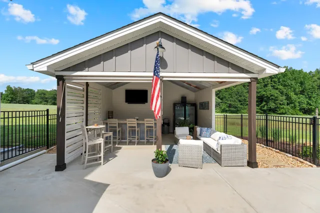 a bathroom with a sink vanity and a toilet