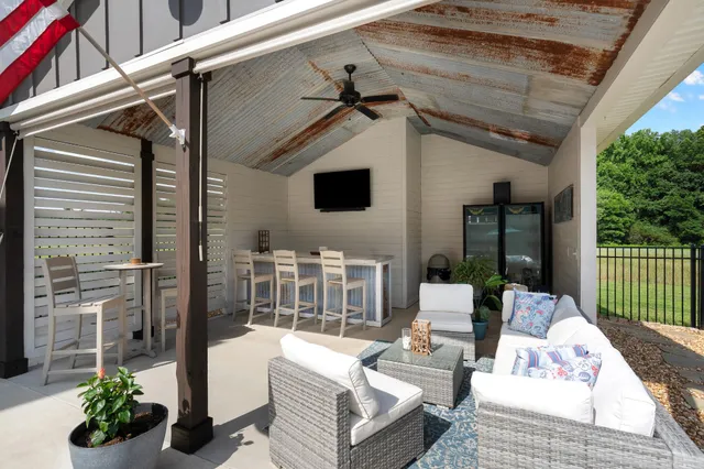 a workspace with furniture and window