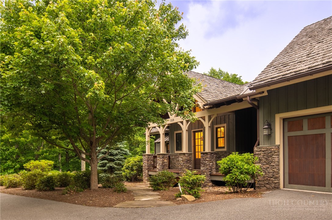 153 Stonecrop Lane Boone, NC 28607 - Photo 44 of 50 a front view of a house with a yard