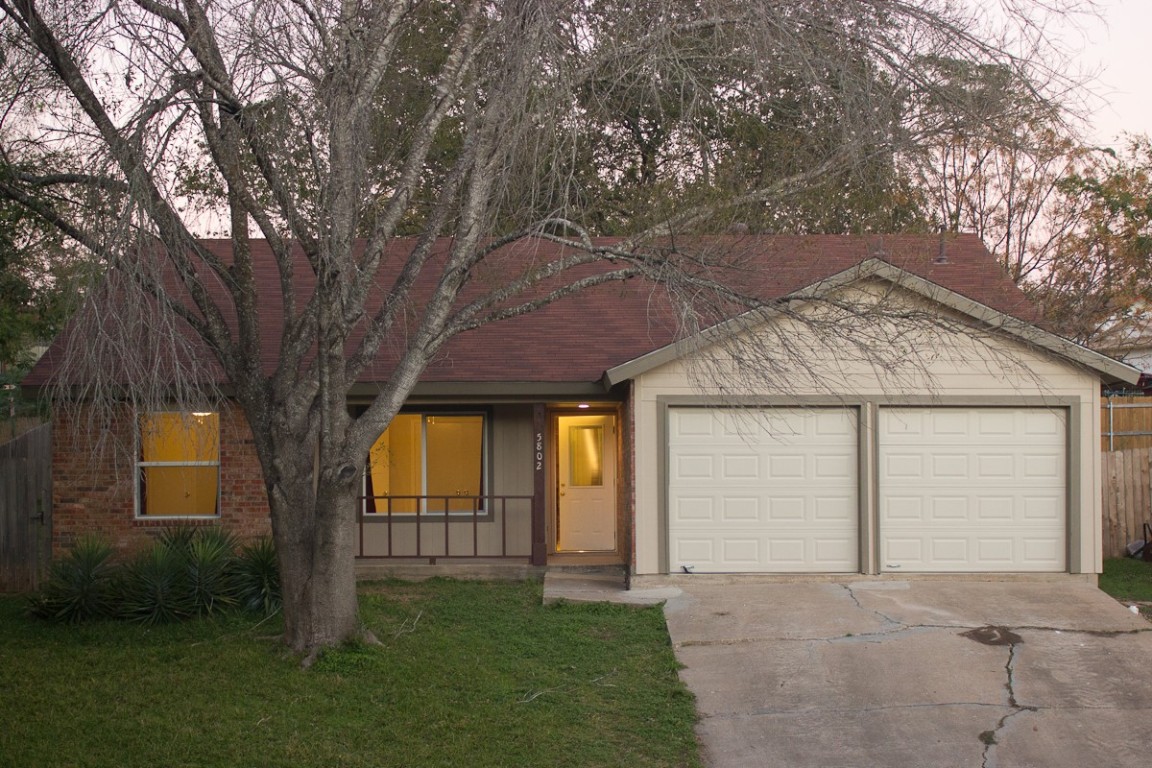 front view of house with a yard