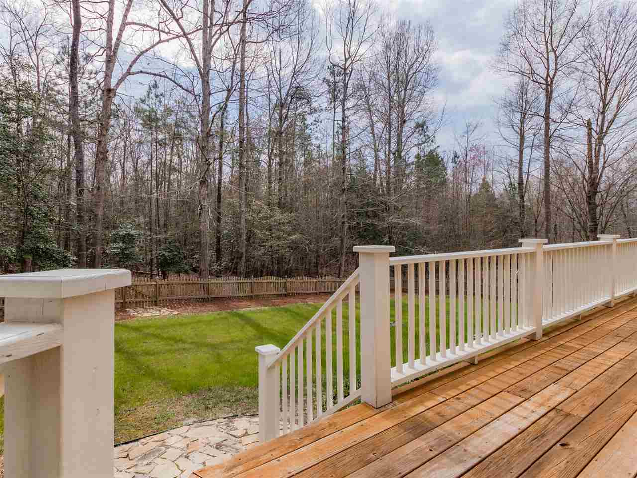 1413 Wynncrest Court Raleigh, NC 27603 - Photo 29 of 30 Scenic back deck overlooks a beautifully wooded area