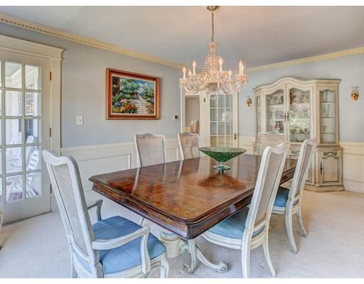 3 Locke Road Chelmsford, MA 01824 - Photo 12 of 31 a view of a dining room with furniture a chandelier and wooden floor