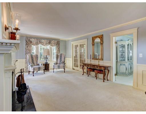 3 Locke Road Chelmsford, MA 01824 - Photo 13 of 31 a living room with furniture a fireplace and large windows