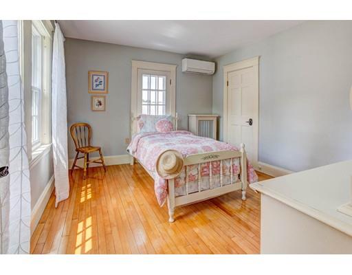 3 Locke Road Chelmsford, MA 01824 - Photo 21 of 31 a bedroom with a bed and a table in it