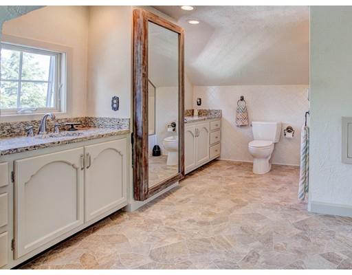 3 Locke Road Chelmsford, MA 01824 - Photo 24 of 31 a bathroom with a toilet sink and mirror