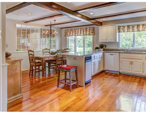 3 Locke Road Chelmsford, MA 01824 - Photo 7 of 31 a open kitchen with a table and chairs in it