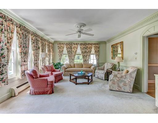 3 Locke Road Chelmsford, MA 01824 - Photo 9 of 31 a living room with furniture and a large window