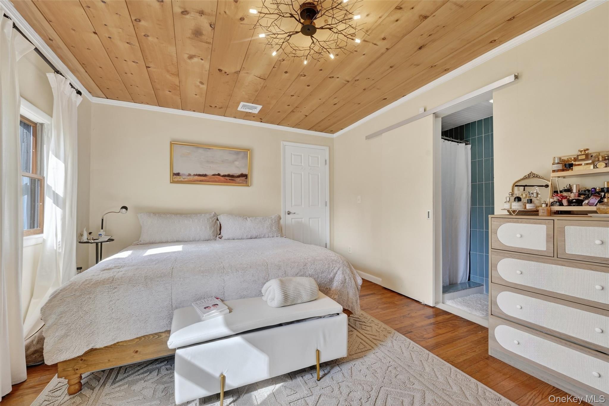 96 Lower Wisner Road Warwick, NY 10990 - Photo 24 of 34 Room featuring a wood-panel ceiling with a decorative light fixture