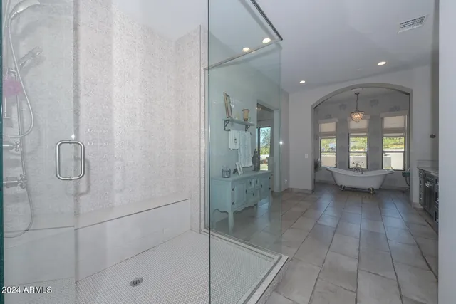 a bathroom with a sink and a window