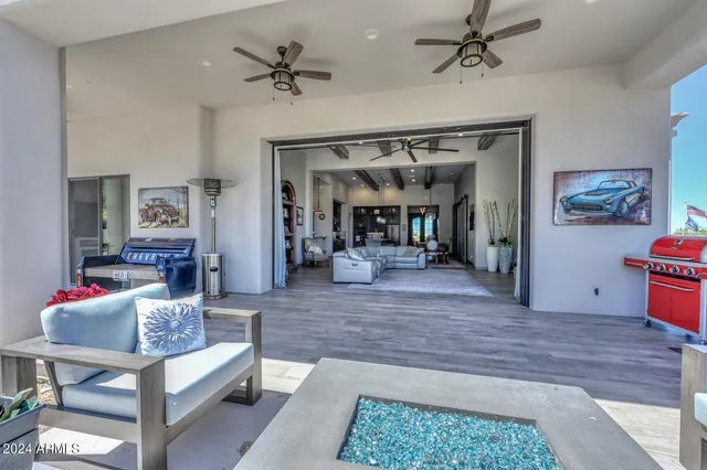 a living room with furniture and a rug