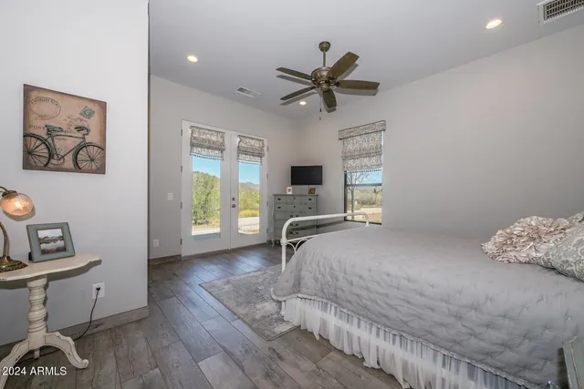 a bathroom with a double vanity sink and mirror