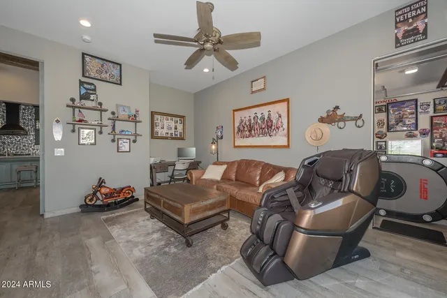 a room with lots of white walls and black and white checkered floor