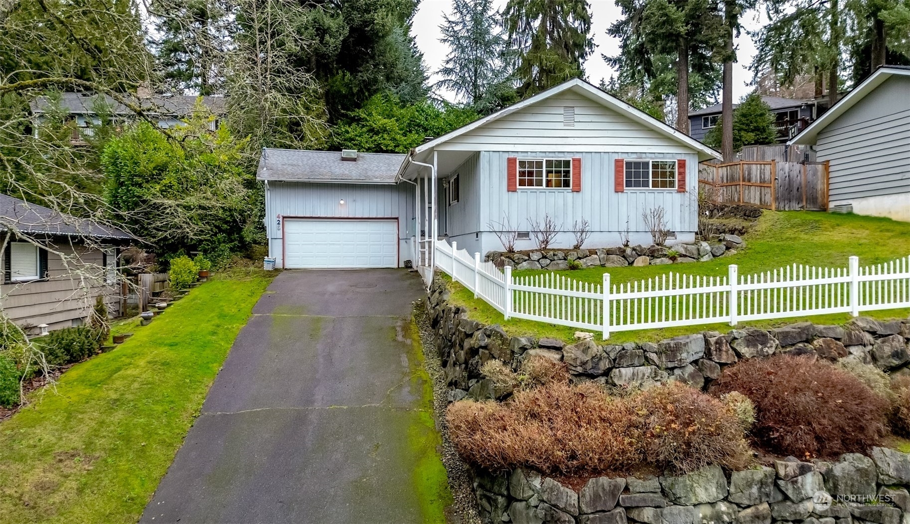 425 Ramsdell Street Fircrest, WA 98466 - Photo 1 of 39 a view of a house with a yard and large trees