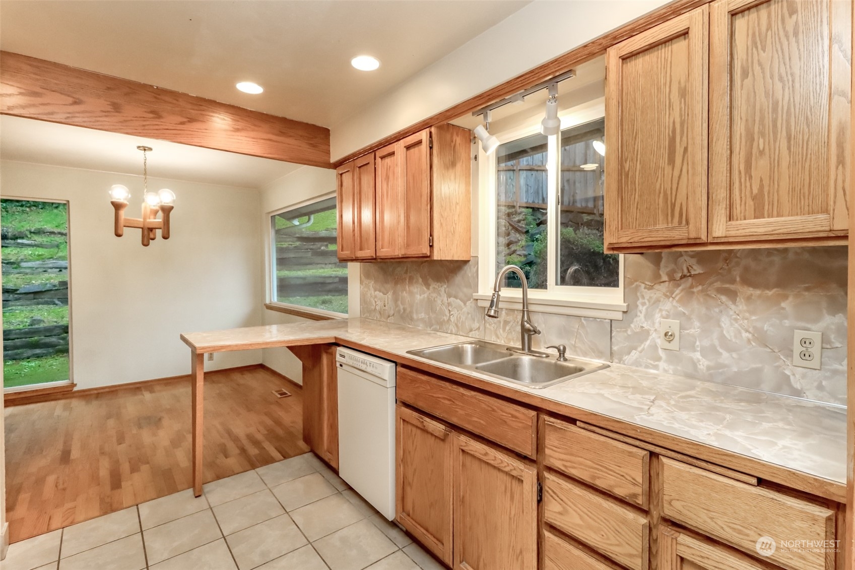 425 Ramsdell Street Fircrest, WA 98466 - Photo 14 of 39 a kitchen with a sink and a window