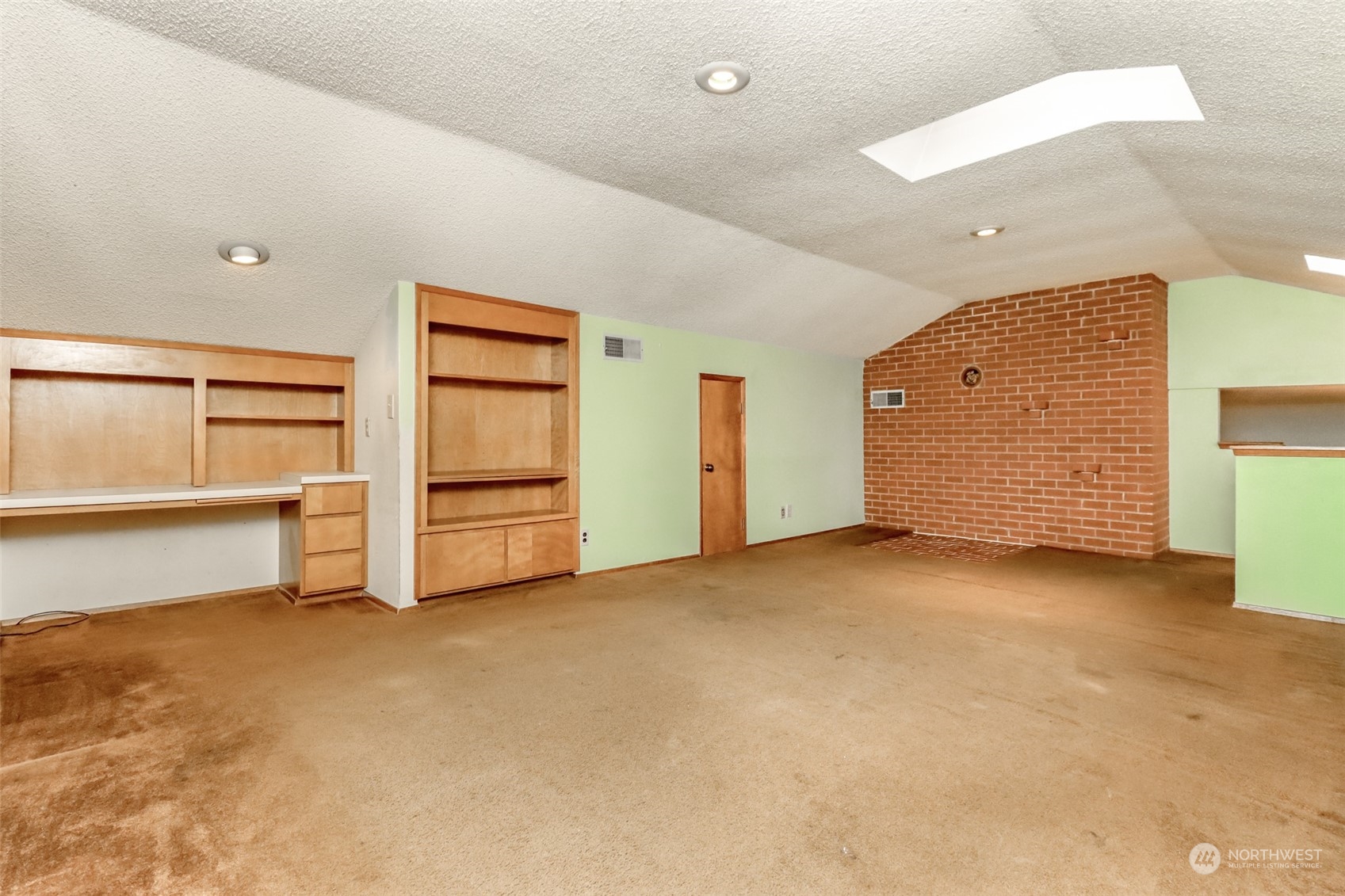 425 Ramsdell Street Fircrest, WA 98466 - Photo 22 of 39 a view of an empty room with a window
