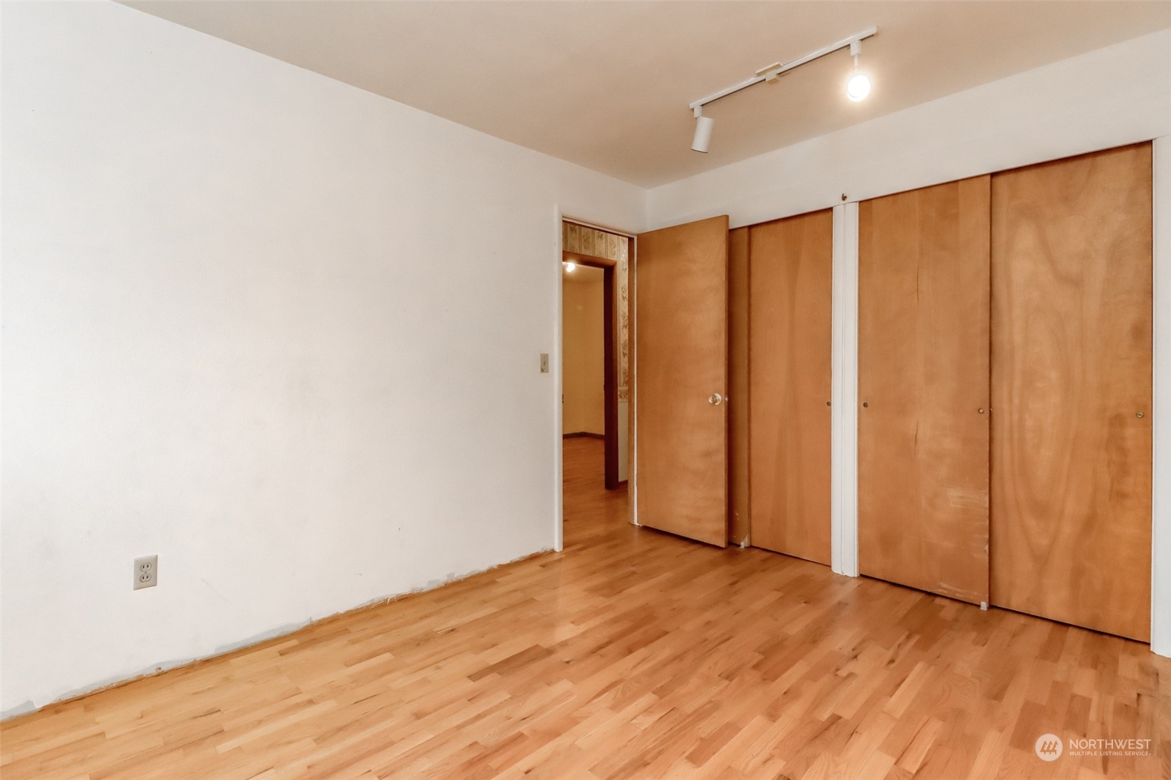 425 Ramsdell Street Fircrest, WA 98466 - Photo 25 of 39 a view of empty room with wooden floor