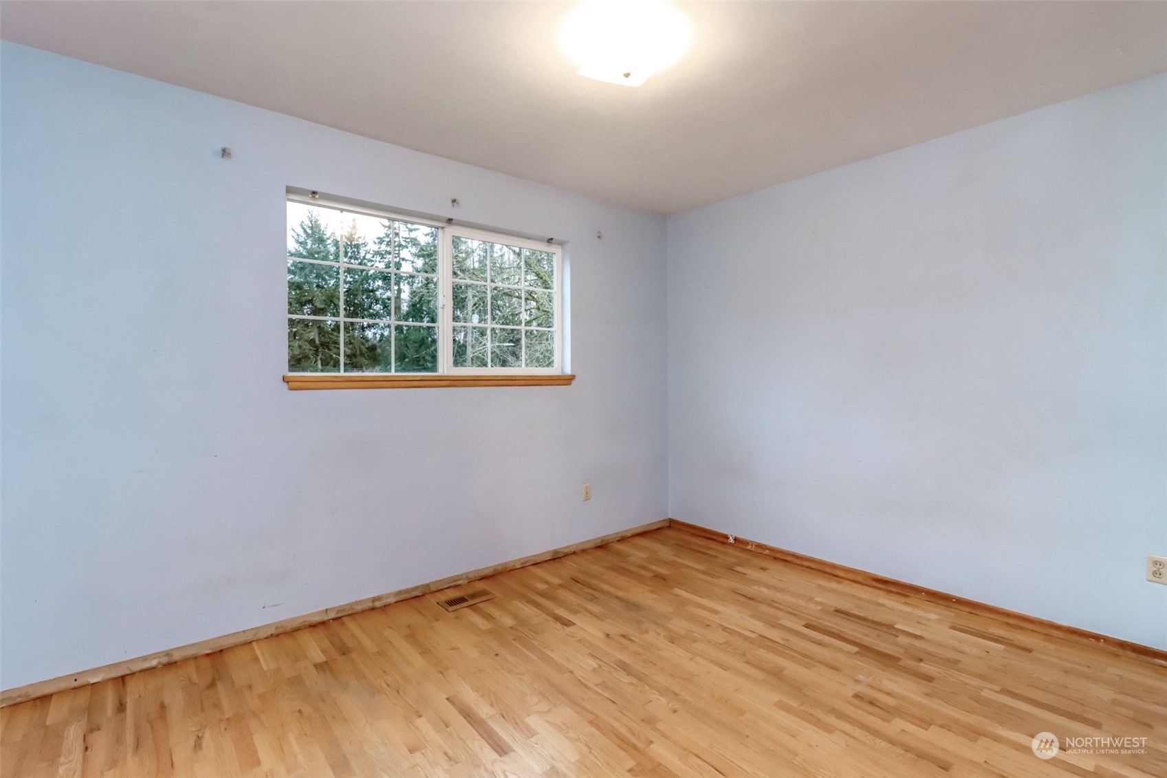 425 Ramsdell Street Fircrest, WA 98466 - Photo 28 of 39 an empty room with a window